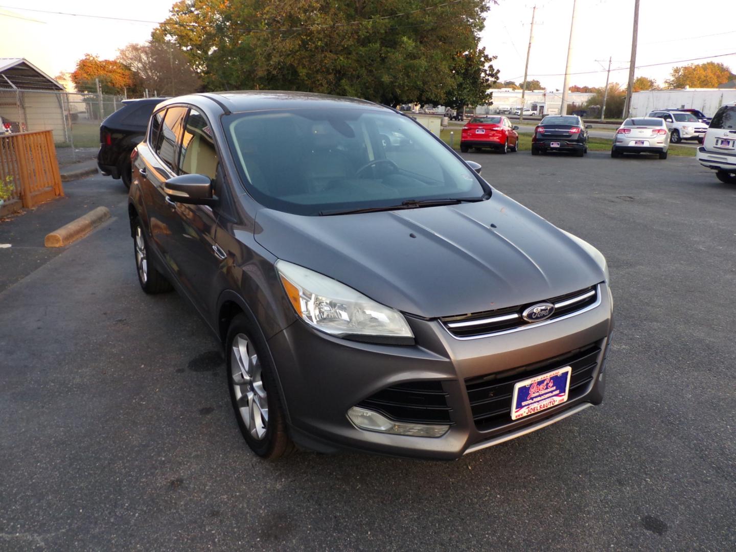 2013 Grey Ford Escape SEL FWD (1FMCU0H96DU) with an 2.0L L4 DOHC 16V engine, 6-Speed Automatic transmission, located at 5700 Curlew Drive, Norfolk, VA, 23502, (757) 455-6330, 36.841885, -76.209412 - Photo#4